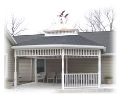 Residents relaxing under the gazebo.